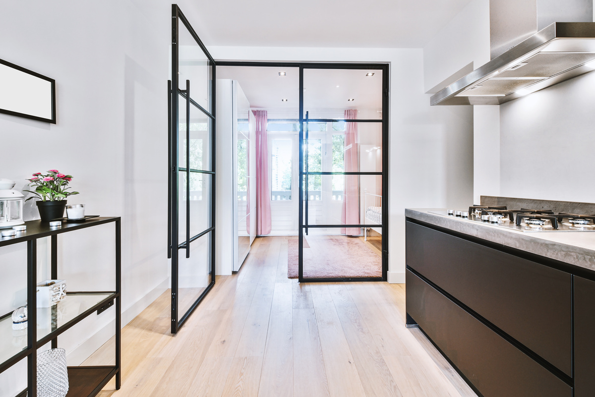 Glass Door between Rooms in Apartment